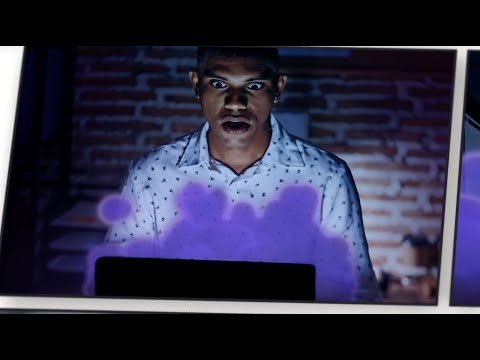Still image shows a person looking at their laptop in fear while a purple fog comes out of it.