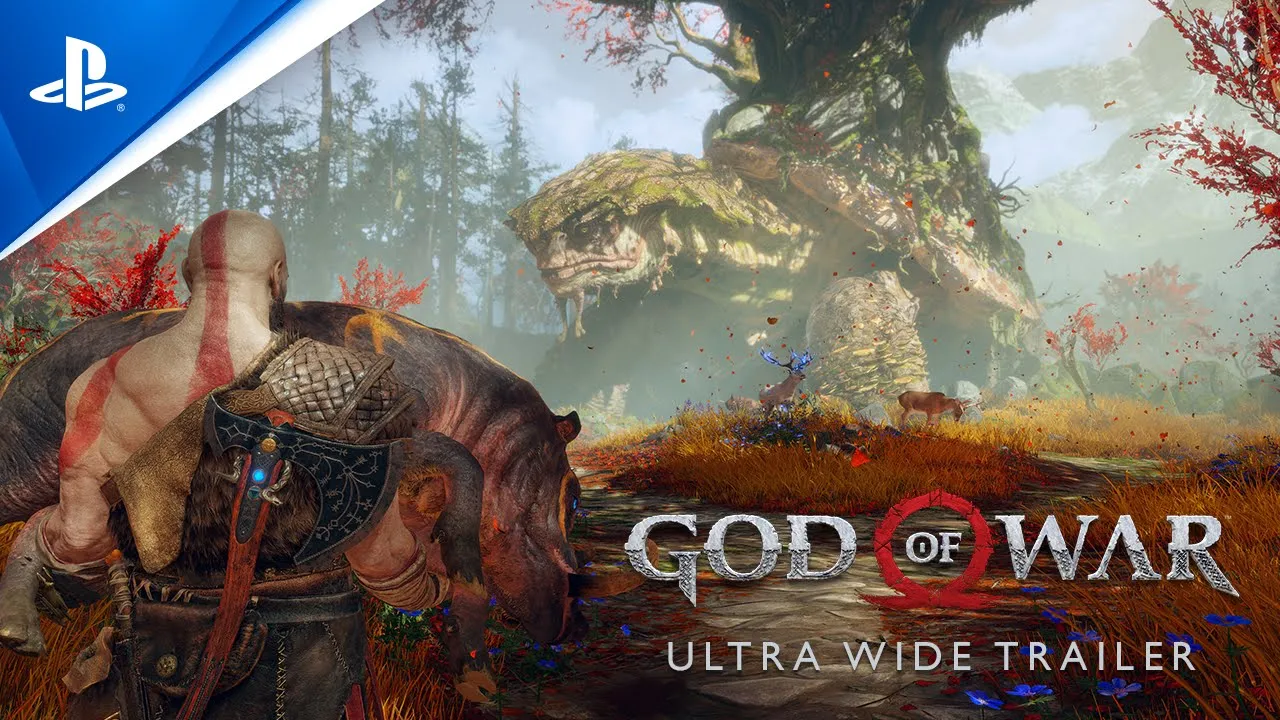 Kratos está de pie en un espacio abierto, mirando un árbol. Selecciona la imagen para reproducir el tráiler.